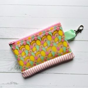 Tutti fruitti splash bag! This water resistant bag is a must have for summer!